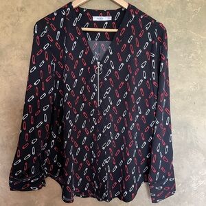 Ricki’s Zip Front V-neck Safety Pin Graphic Blouse